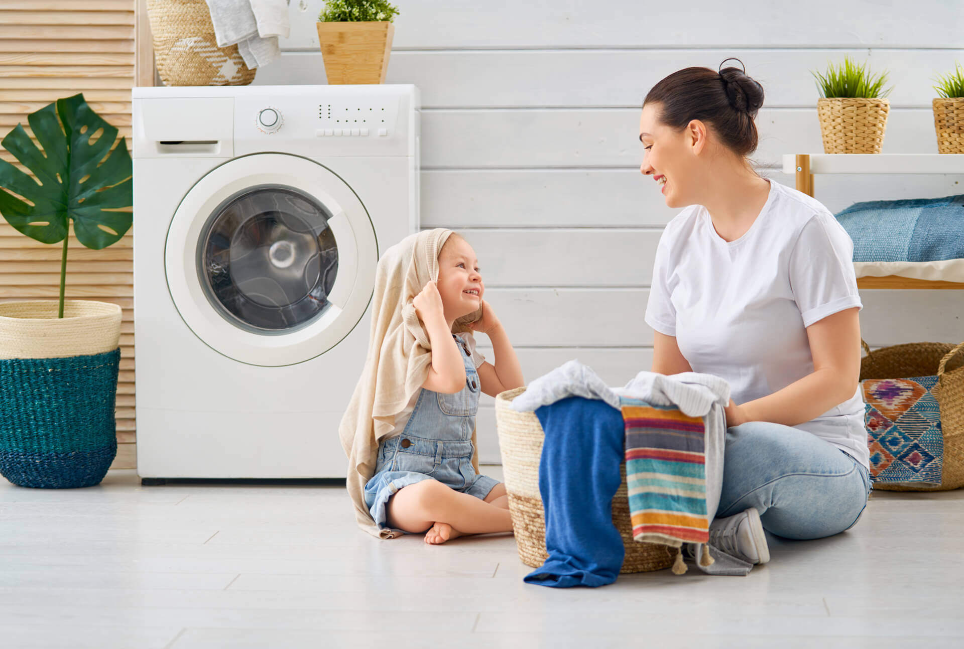 family-doing-laundry-UGKFW5J